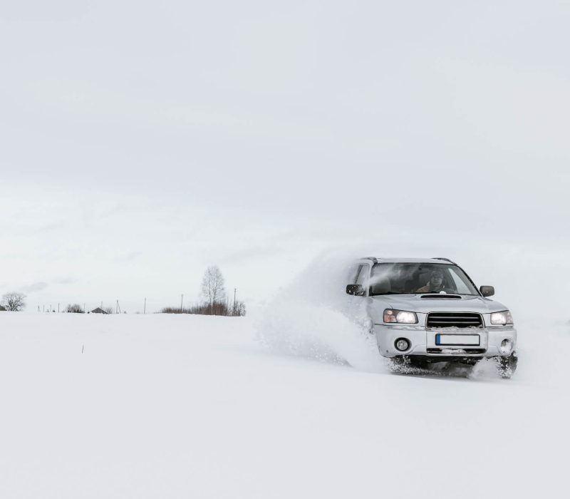 car-driving-on-snow-field-1.jpg